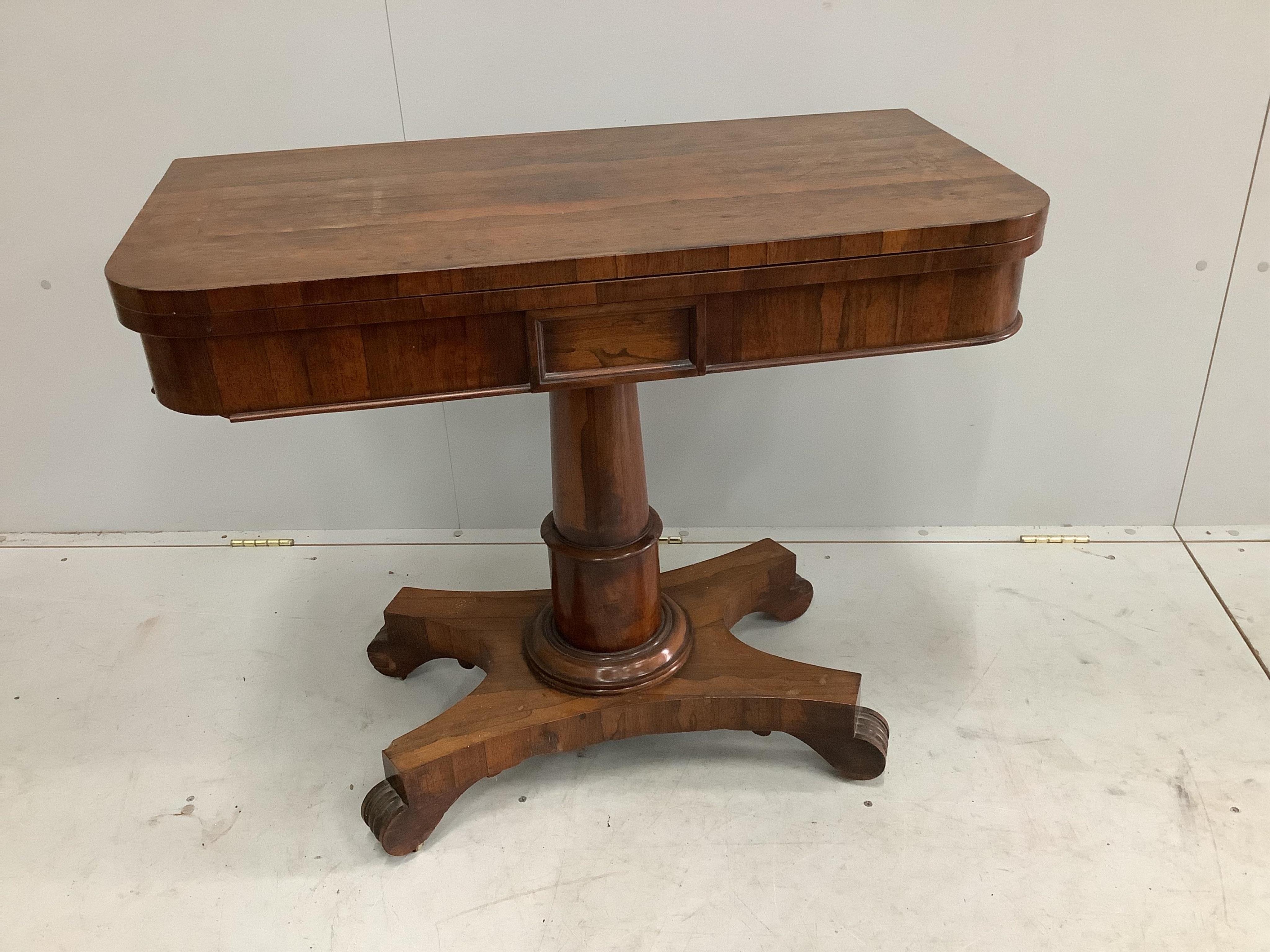 An early Victorian rosewood folding card table, width 90cm, depth 44cm, height 75cm